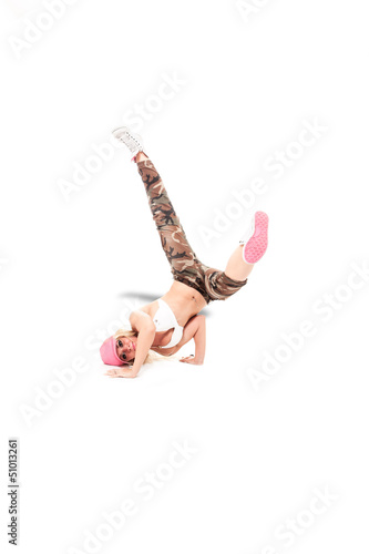 Photo: Female Break dancer performing freeze Female Break dancer performing freeze