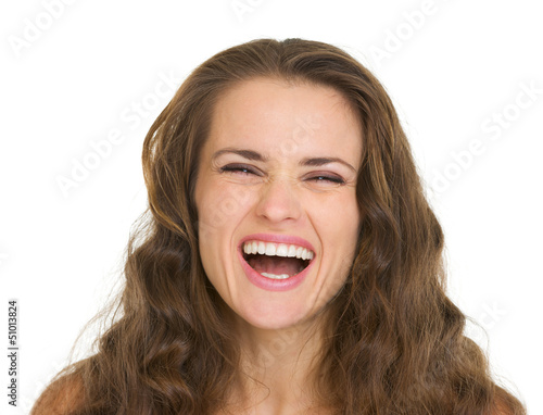 Photo: Portrait of happy young woman Portrait of happy young woman