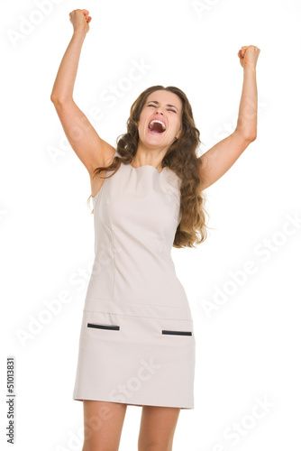 Photo: Portrait of happy young woman rejoicing success Portrait of happy young woman rejoicing success