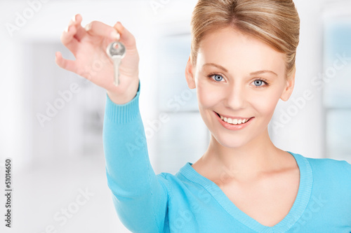 Photo: happy woman with keys happy woman with keys