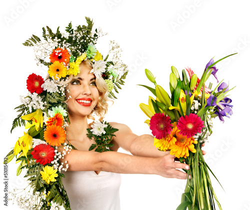 Photo: Woman with make up and flower. Woman with make up and flower.