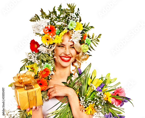 Photo: Woman with gift box and flower. Woman with gift box and flower.