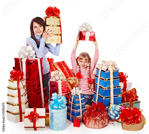Photo: Happy family with child and group gift box. Happy family with child and group gift box.