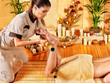 Woman getting feet massage