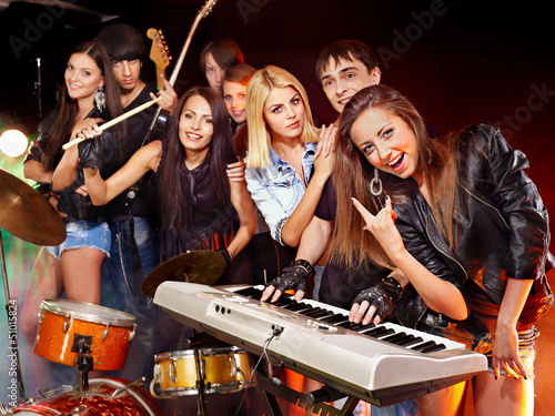 Photo: Band playing musical instrument. Band playing musical instrument.