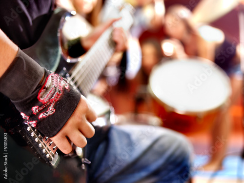 Photo: Band playing musical instrument. Band playing musical instrument.