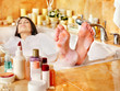 Woman relaxing at  bubble bath.