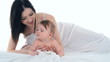 Family mother and a small child playing