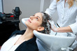 attractive woman washing her hair