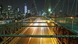 Time lapse of city traffic on Brooklyn bridge at night