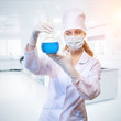 laboratory assistant analyzing a liquid