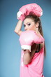 Female boxer model with big fun pink gloves