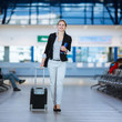 Pretty young female passenger at the airport