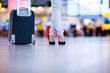 Pretty young female passenger at the airport (shallow DOF; color