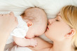 Mother breast feeding her infant