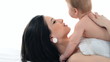 Family mother and a small child playing