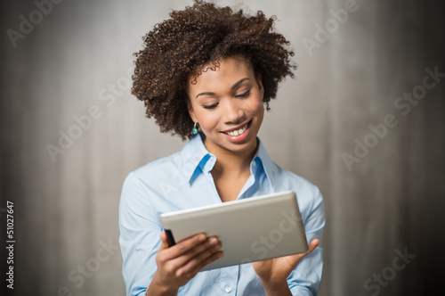 Photo: Businesswoman Using Digital Tablet Businesswoman Using Digital Tablet