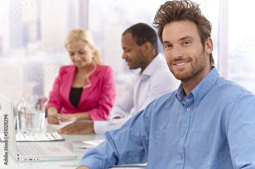 Photo: Portrait of confident young businessman Portrait of confident young businessman