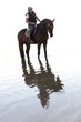 Photo: Horse riding in the water Horse riding in the water