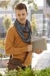 Portrait of young male student outdoors