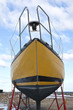 Yellow Sailboat Stored for Winter