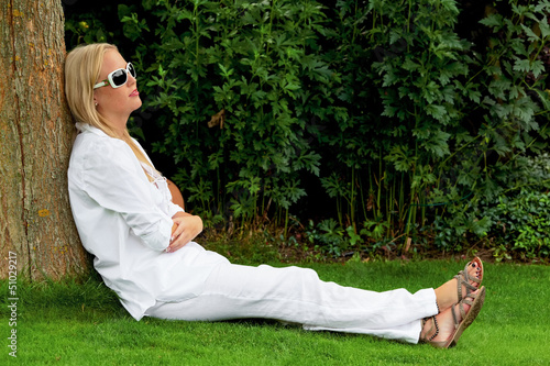 Photo: Portrait einer Frau mit Sonnenbrille Portrait einer Frau mit Sonnenbrille