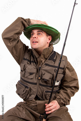 Photo: A portrait of a fisherman with fishing pole A portrait of a fisherman with fishing pole