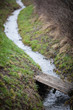 small stream in field
