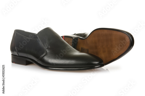 Photo: Fashion concept with male shoes on white Fashion concept with male shoes on white