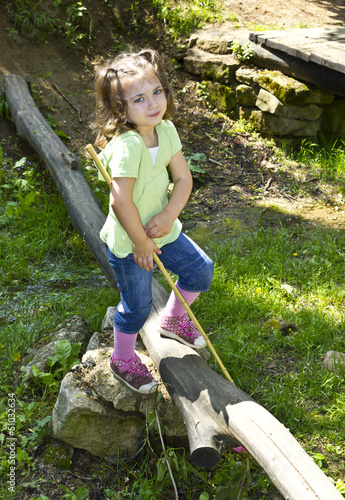 Photo: Cute toddler holding a butterfly net Cute toddler holding a butterfly net
