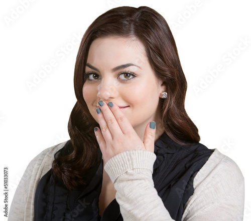 Photo: Smiling Woman Covering Mouth Smiling Woman Covering Mouth