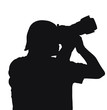 Silhouette of a men's hands held camera (clipping path)