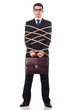 Businessman tied up with rope on white