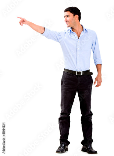 Photo: Business man pointing away Business man pointing away