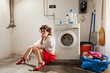 housewife bored in the laundry