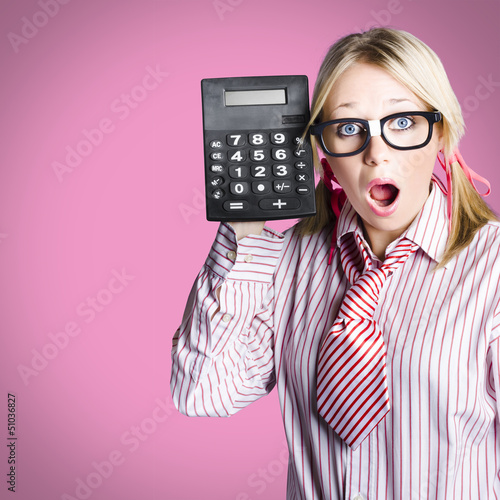 Photo: Nerdy accounting clerk showing tax return savings Nerdy accounting clerk showing tax return savings