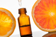 Essential oil with orange_Olio essenziale con fetta di arancio