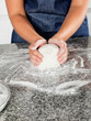 Female Chef Kneading Dough