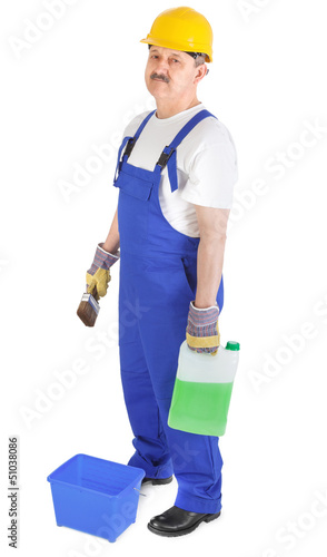 Photo: manual worker with green liquid manual worker with green liquid