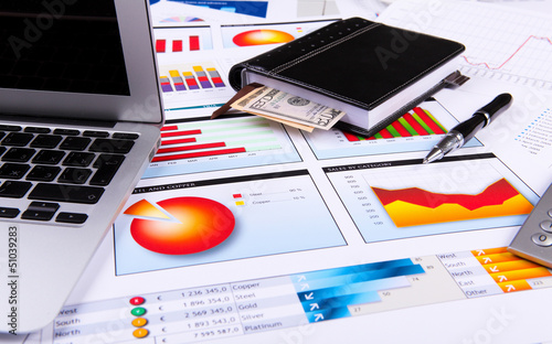 Photo: Financial papers on the table Financial papers on the table
