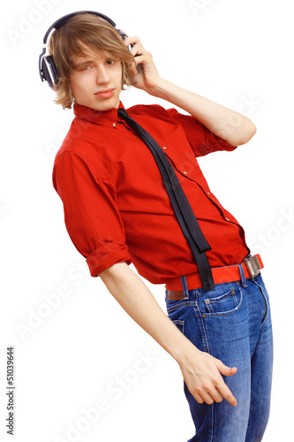 Photo: Happy smiling young man dancing Happy smiling young man dancing