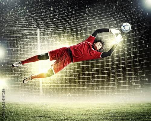 Photo: Goalkeeper catches the ball Goalkeeper catches the ball