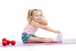 Child girl doing exercises and showing thumb up