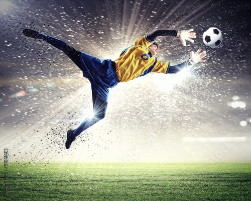 Photo: Goalkeeper catches the ball Goalkeeper catches the ball