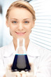 lab worker holding up test tube