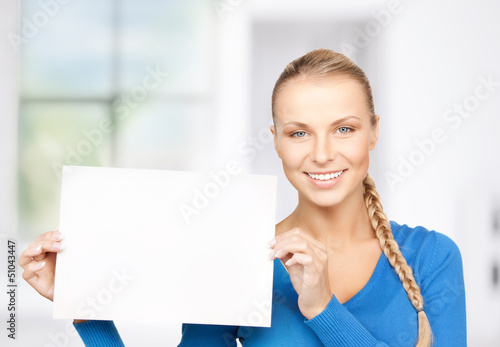 Photo: woman with blank board woman with blank board