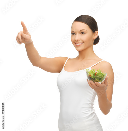 Photo: healthy woman holding bowl with salad healthy woman holding bowl with salad