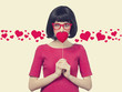 Beautiful girl with toy heart.