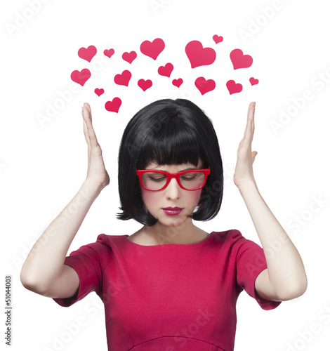 Photo: girl in red glasses at white background. girl in red glasses at white background.