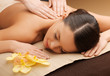 woman in spa salon lying on the massage desk